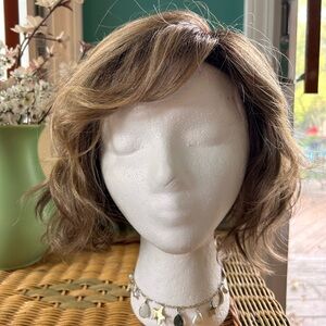 Harper Beach Waves wig by Envy. Color is Toasted Sesame. Synthetic